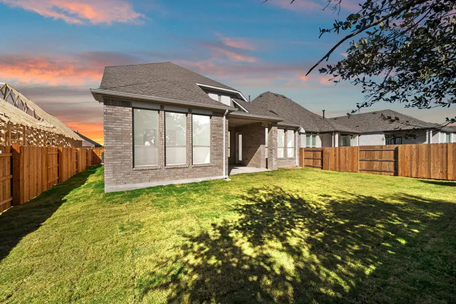 Rear of Home and Private Backyard