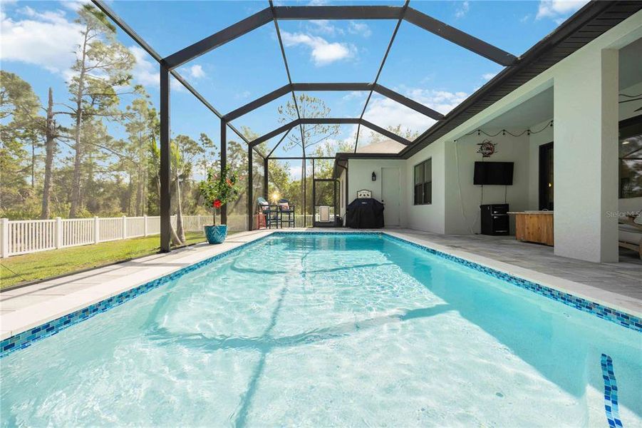 Exterior details and patio area of a home in , Port Charlotte (Image 24).