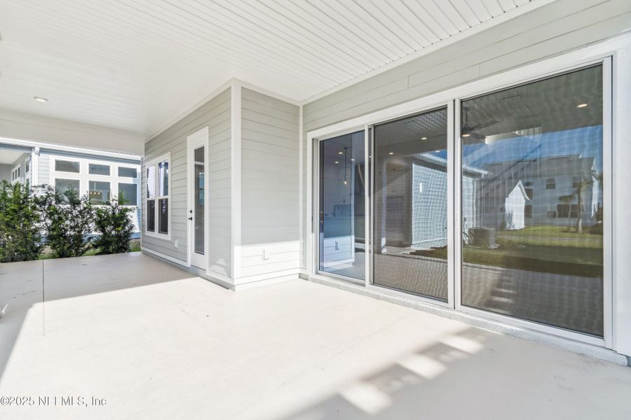Exterior details and patio area of a home in Seven Pines 50' Rear Entry, Jacksonville (Image 3). Exterior details and patio area of a home in Seven Pines 50' Rear Entry, Jacksonville (Image 3).