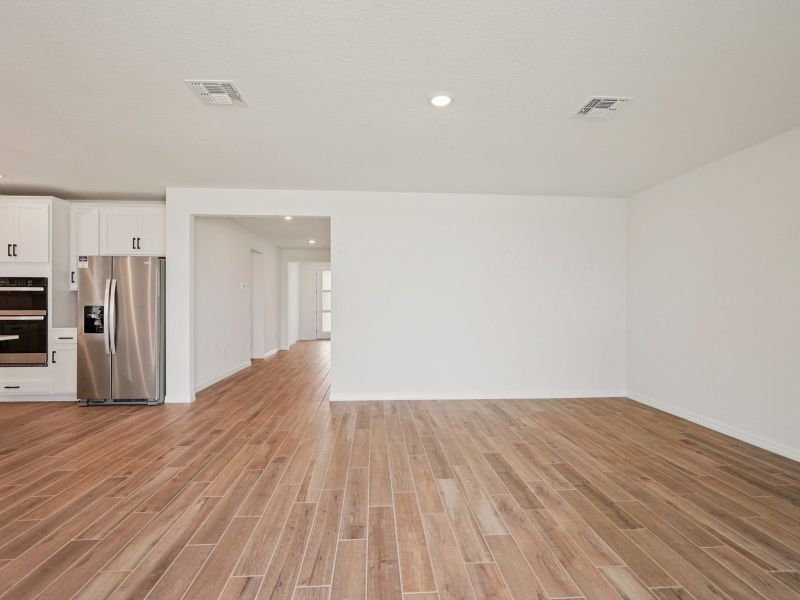 Spacious, unfurnished interior of a new home in Oakfield Trails - Signature Series, Parrish (Image 9). Spacious, unfurnished interior of a new home in Oakfield Trails - Signature Series, Parrish (Image 9).