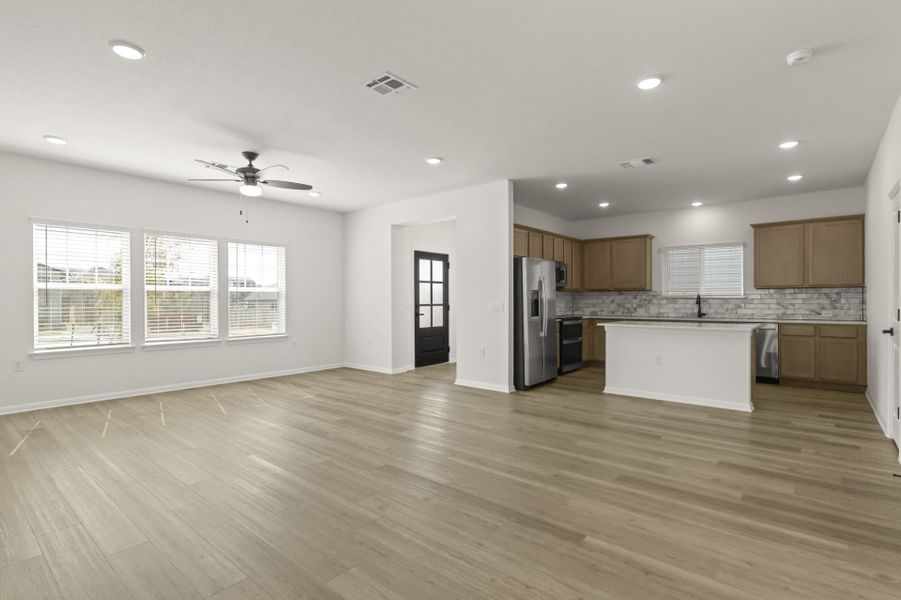 Spacious, unfurnished interior of a new home in Whisper Valley, Manor (Image 19).