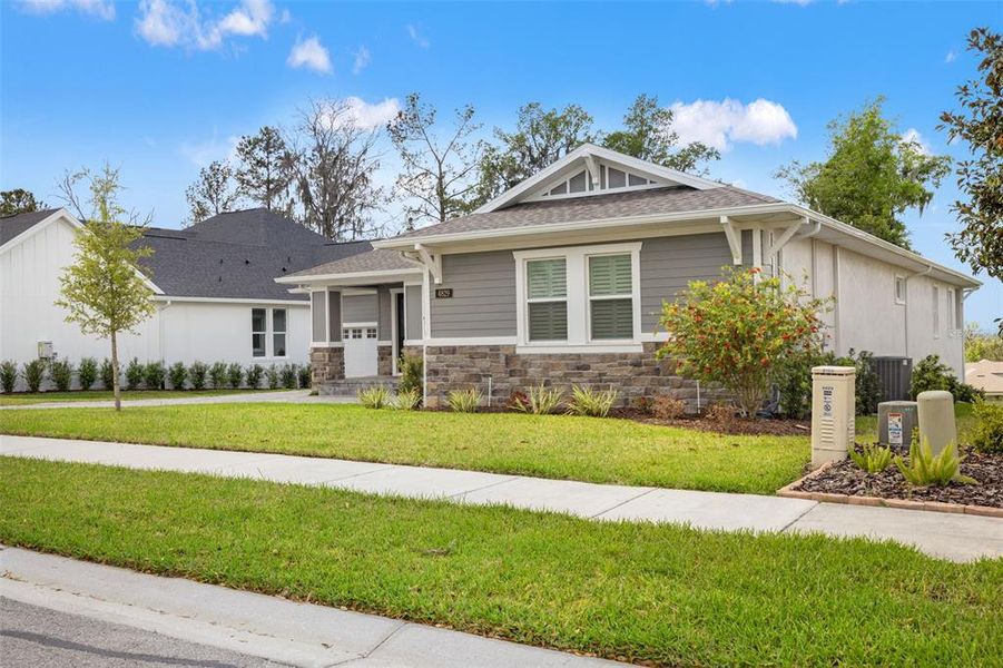Front exterior of a new home in , Brooksville, FL, highlighting curb appeal (Image 22).