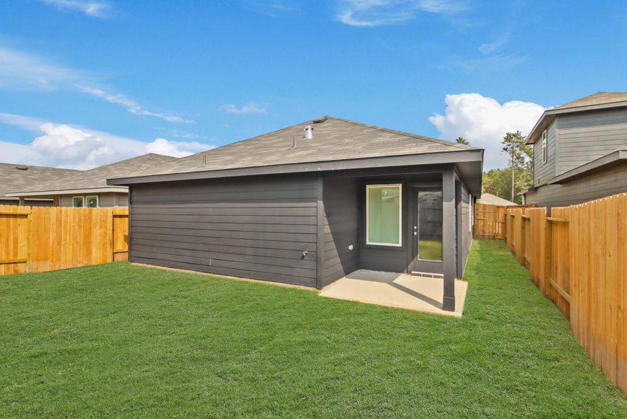 Exterior details and patio area of a home in Venetian Pines, Conroe (Image 2). Exterior details and patio area of a home in Venetian Pines, Conroe (Image 2).