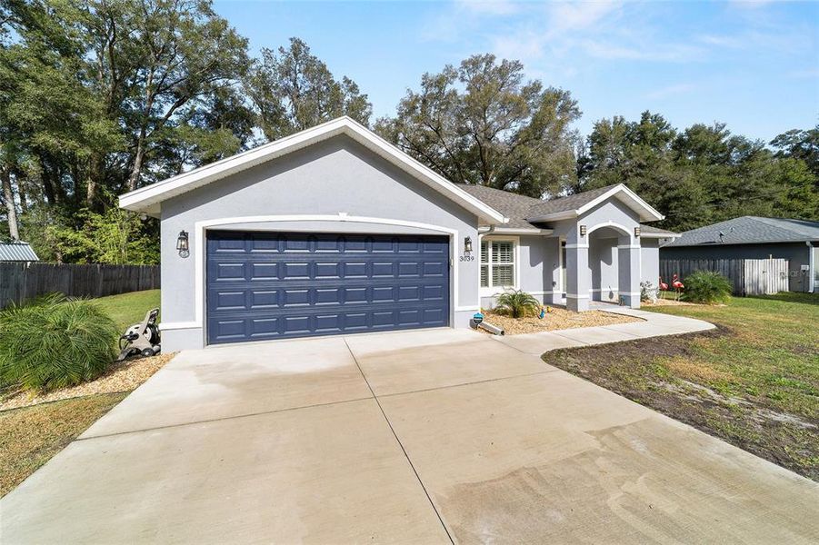 Front exterior of a new home in , Summerfield, FL, highlighting curb appeal (Image 26). Front exterior of a new home in , Summerfield, FL, highlighting curb appeal (Image 26).