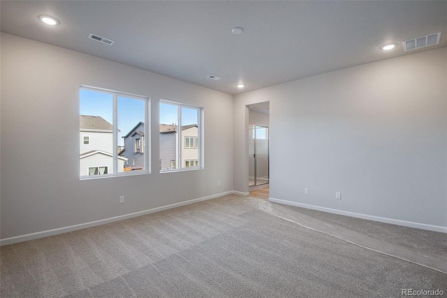Spacious, unfurnished interior of a new home in Medley at Reunion Ridge, Commerce City (Image 25).