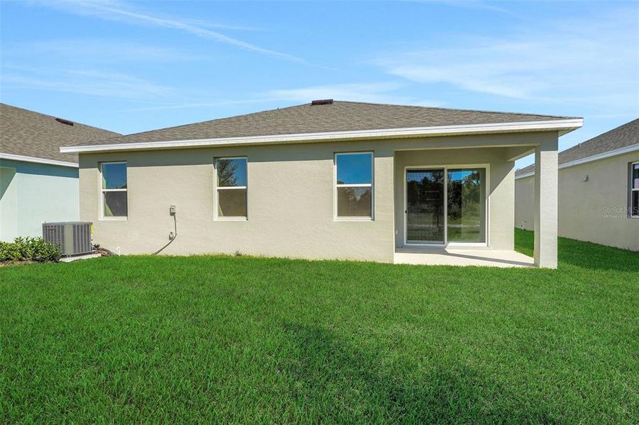 Exterior details and patio area of a home in Willowbrook North, Winter Haven (Image 17). Exterior details and patio area of a home in Willowbrook North, Winter Haven (Image 17).