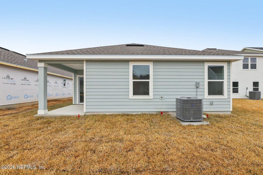 Exterior details and patio area of a home in Kings Landing, Jacksonville (Image 6).