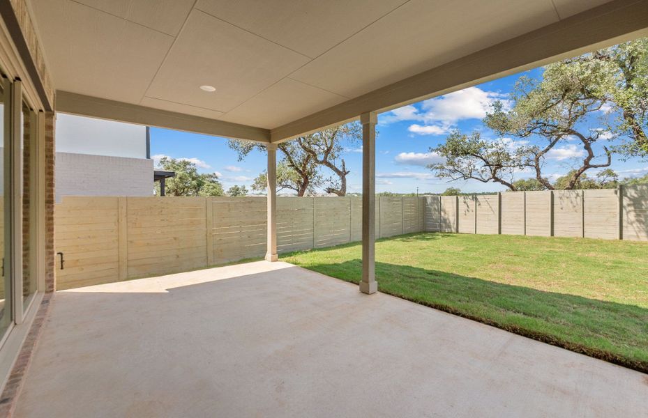 Exterior details and patio area of a home in Wolf Ranch, Georgetown (Image 25).