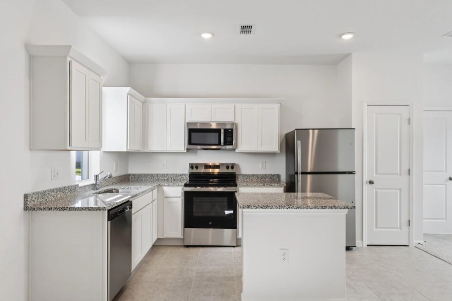 Representative furnished interior of a home built from the Keele by Starlight Homes in Hawks Run, Kissimmee (Image 10).