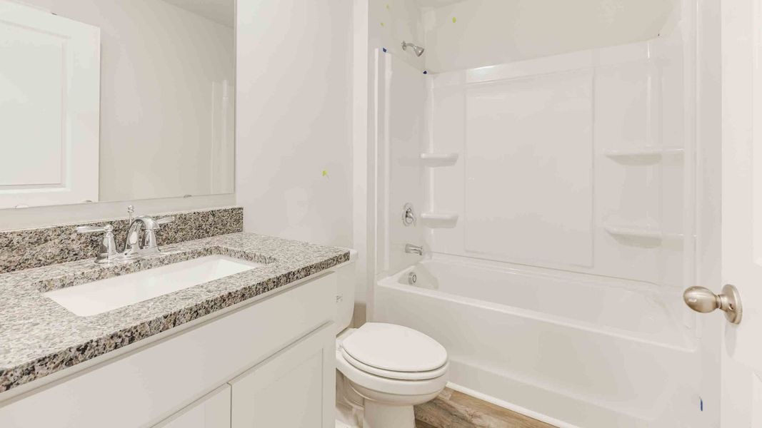 Furnished interior view inside a new home in Cedar Hill Landing, Navassa (Image 11).