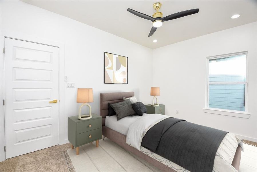 The upstairs secondary bedrooms offer comfort and style, featuring plush carpeting, modern ceiling fans, and recessed lighting. Bright and airy, these rooms provide a cozy retreat for family or guests.