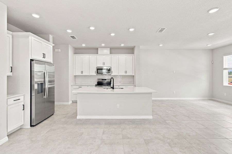 Representative furnished interior of a home built from the The Darwin by David Weekley Homes in Palmeras at Crossprairie – The Palms Collection, St. Cloud (Image 6).