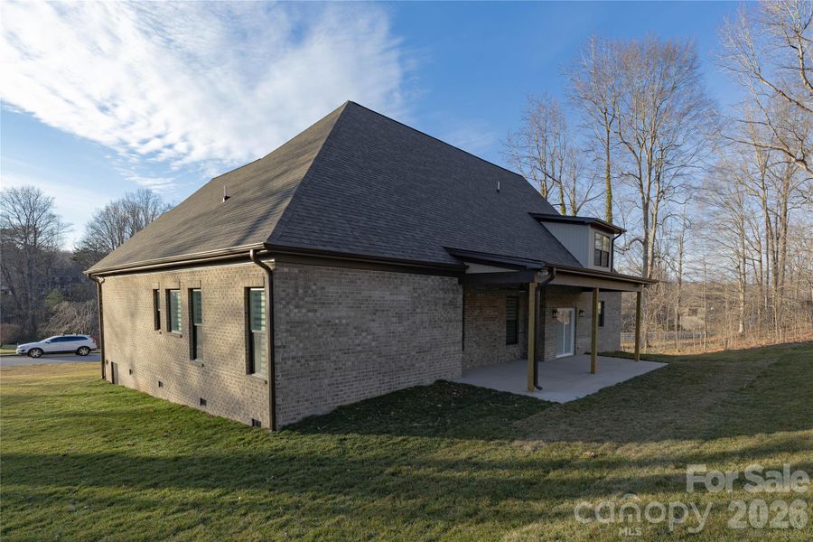 Exterior details and patio area of a home in , Conover (Image 4).