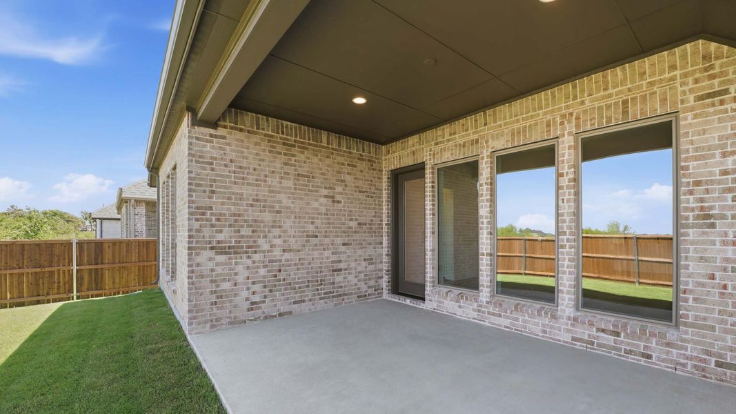 Exterior details and patio area of a home in Devonshire, Forney (Image 4).