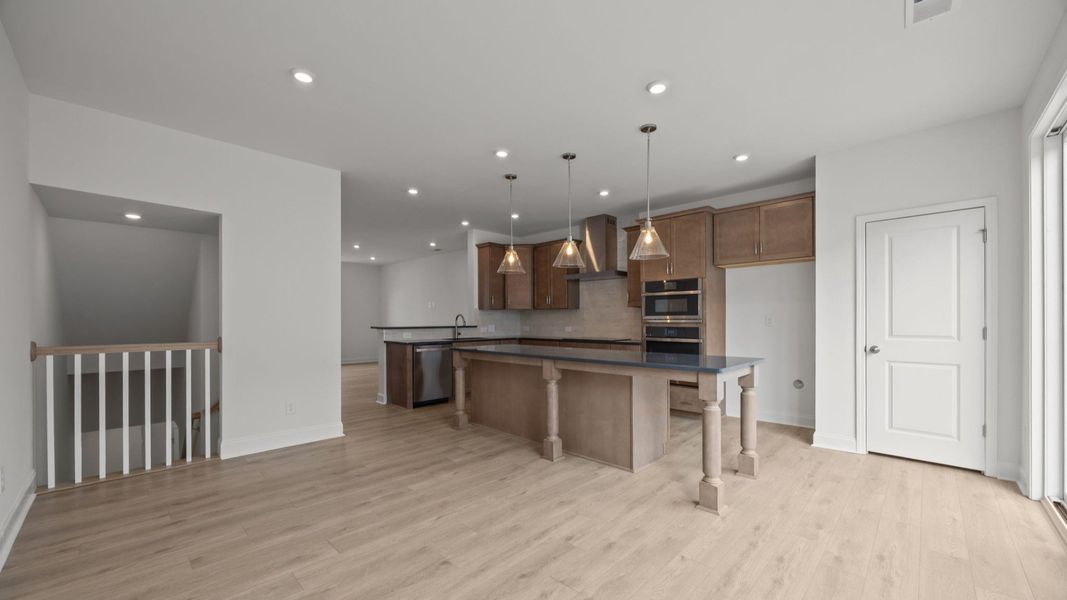 Landon Plan in River District by DRB Homes in Charlotte NC- Kitchen and Living Area Landon Plan in River District by DRB Homes in Charlotte NC- Kitchen and Living Area