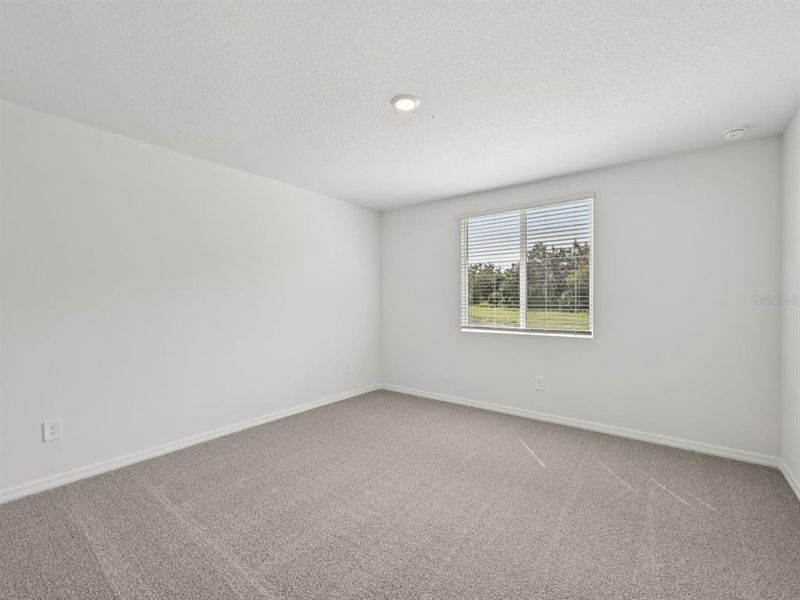 Spacious, unfurnished interior of a new home in The Reserve at Van Oaks, Auburndale (Image 26).