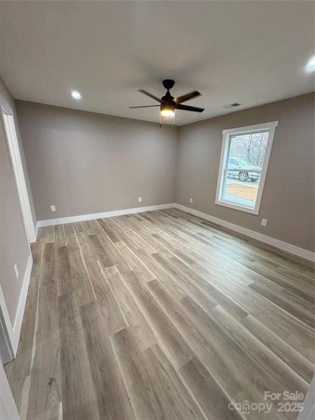 Spacious, unfurnished interior of a new home in , Lenoir (Image 8).