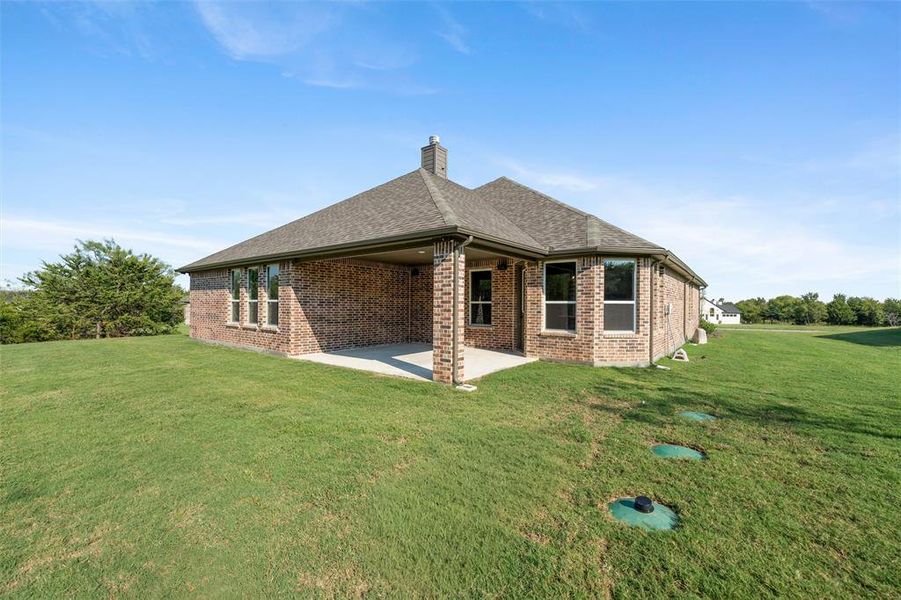Front exterior of a new home in Vista Oaks Estates, Royse City, TX, highlighting curb appeal (Image 22).
