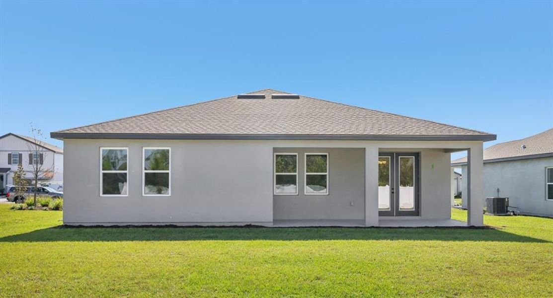 Exterior details and patio area of a home in Tyson Reserve, St. Cloud (Image 19).