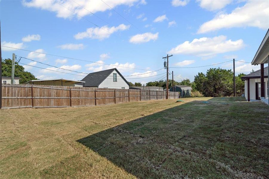 Exterior details and patio area of a home in , Granbury (Image 27).