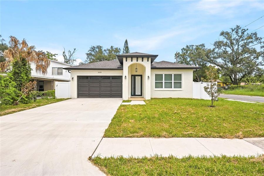Front exterior of a new home in , Tampa, FL, highlighting curb appeal (Image 20). Front exterior of a new home in , Tampa, FL, highlighting curb appeal (Image 20).