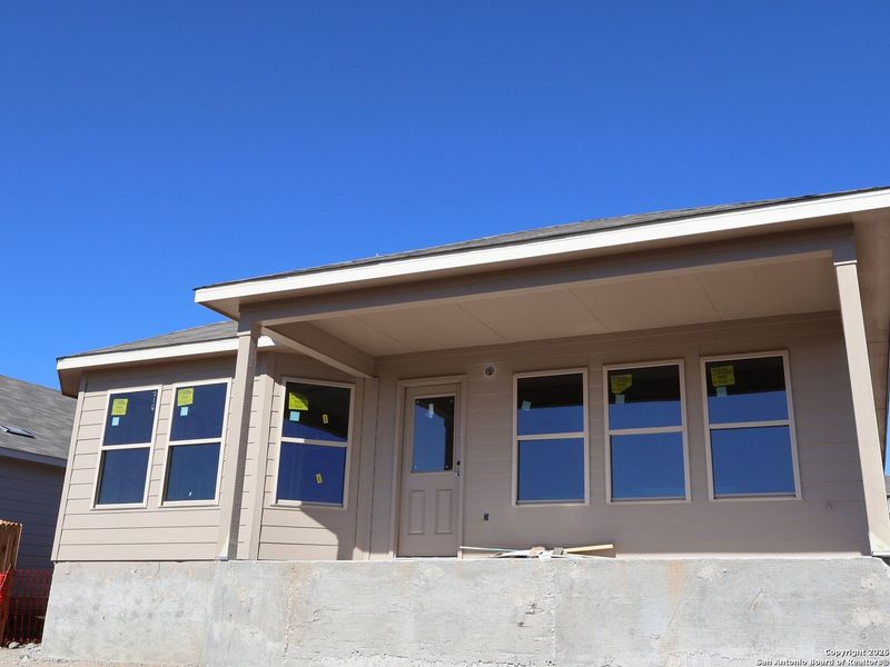 Exterior details and patio area of a home in Hunters Ranch, San Antonio (Image 18).