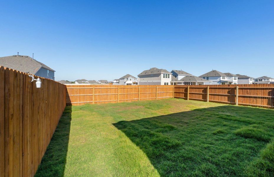 Exterior details and patio area of a home in Santa Rita Ranch, Liberty Hill (Image 24). Exterior details and patio area of a home in Santa Rita Ranch, Liberty Hill (Image 24).
