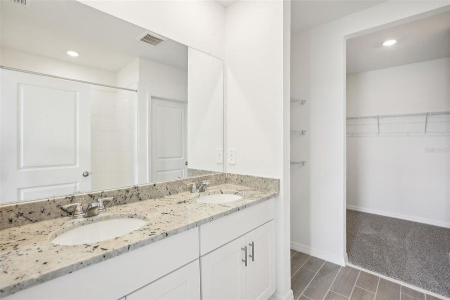 Furnished interior view inside a new home in Benton Hills - Classic Series, Brooksville (Image 9). Furnished interior view inside a new home in Benton Hills - Classic Series, Brooksville (Image 9).