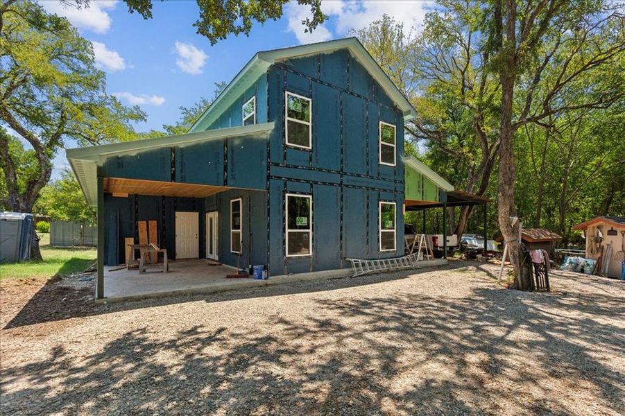 Back of property featuring a patio