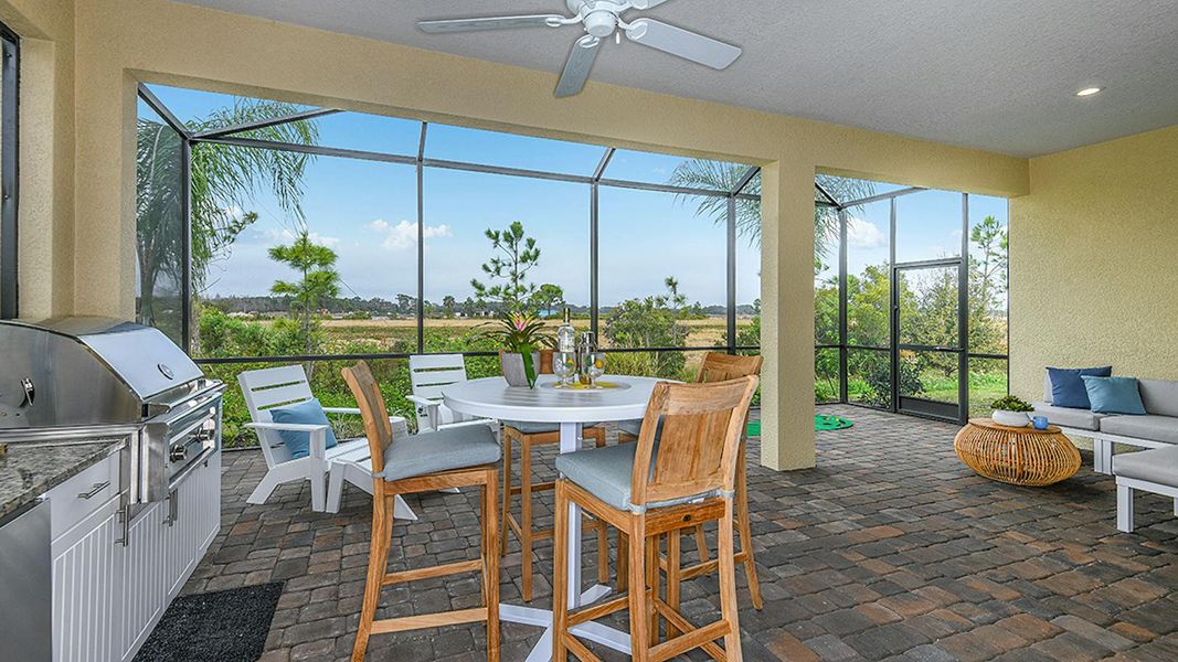 Exterior details and patio area of a home in Canoe Creek Real Estate and Homes for Sale in Parrish, FL - Neal Communities, Parrish (Image 23).