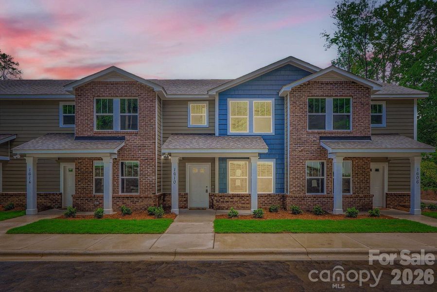 Front exterior of a new home in , Charlotte, NC, highlighting curb appeal (Image 26).