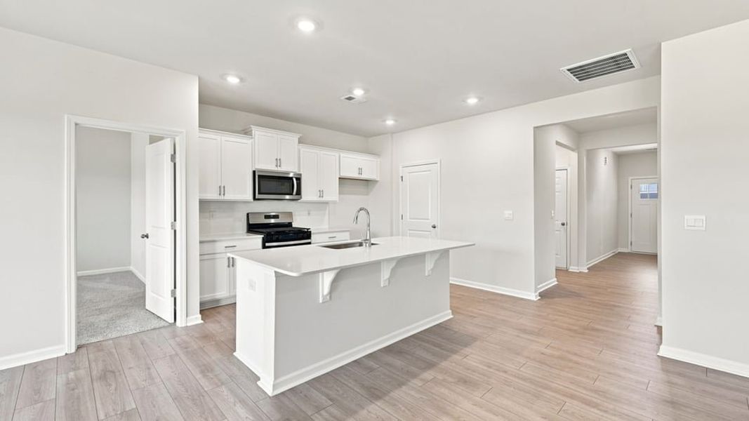 Furnished interior view inside a new home in Hunters Ridge, Woodruff (Image 6).