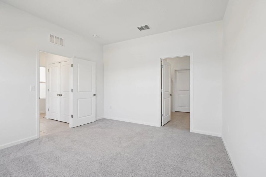 Representative unfurnished interior of a home built from the Keele by Starlight Homes in Hawks Run, Kissimmee (Image 24).