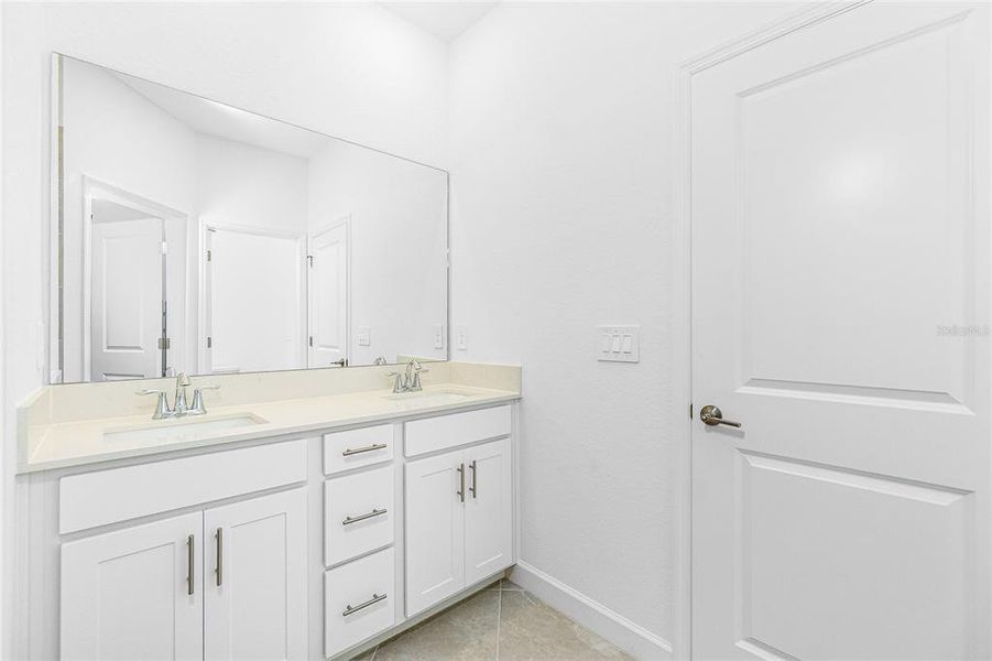 Furnished interior view inside a new home in Island Lakes at Coco Bay: Villas, Englewood (Image 6).