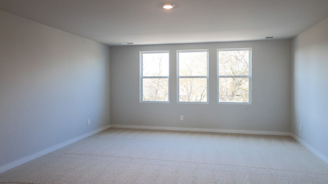 Representative unfurnished interior of a home built from the STONEBROOK II by D.R. Horton in Harvest Point, Spring Hill (Image 47).