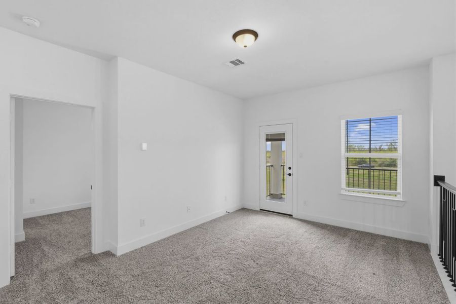 Representative unfurnished interior of a home built from the Sorenstam by Chesmar Homes in Riceland Alley Loads, Mont Belvieu (Image 63).