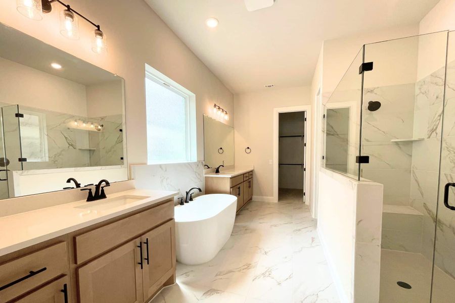 Furnished interior view inside a new home in Whisper Valley, Manor (Image 13).