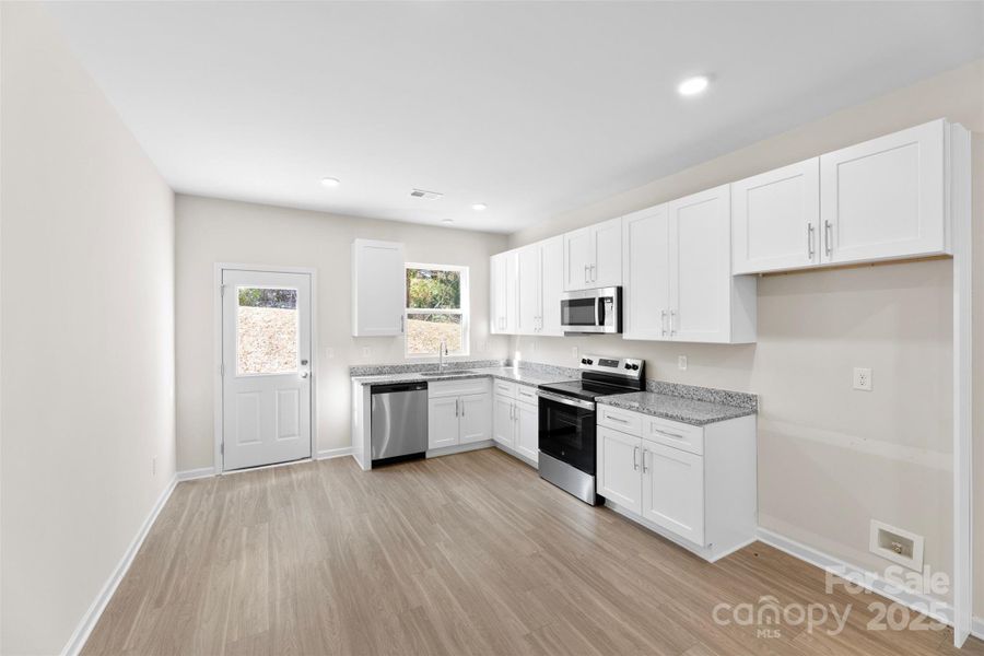 Furnished interior view inside a new home in , Spencer (Image 7).