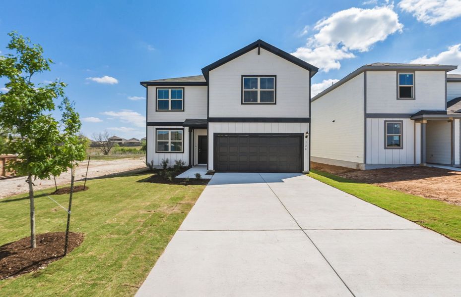 Front exterior of a new home in Sonterra, Jarrell, TX, highlighting curb appeal (Image 19).