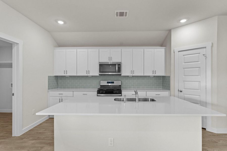 Furnished interior view inside a new home in Hartland Ranch, Lockhart (Image 7).