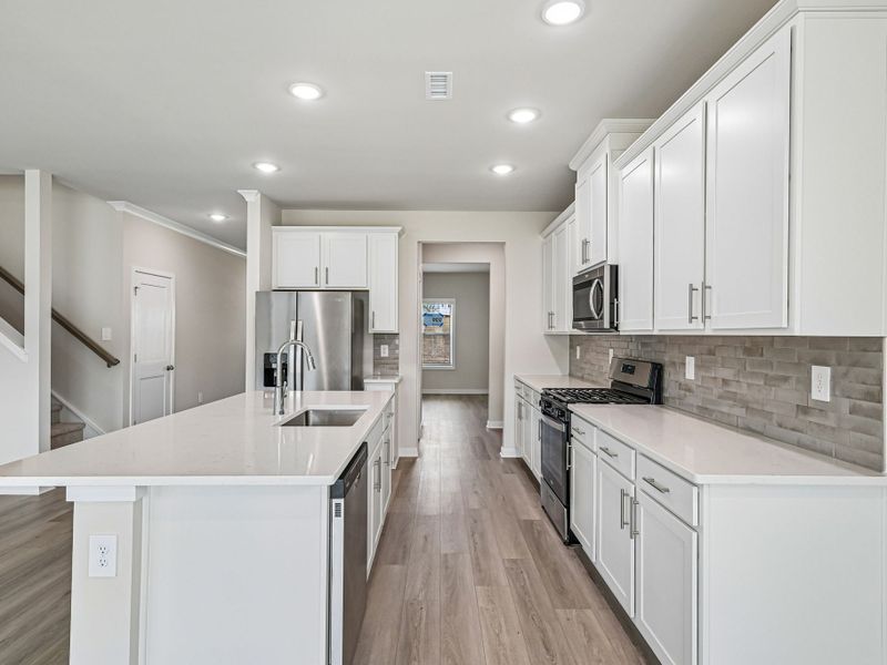 Furnished interior view inside a new home in Avalon Place - Signature Series, Durham (Image 6).