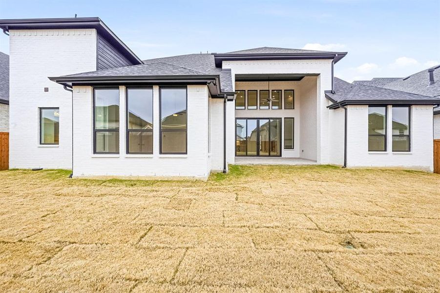 Exterior details and patio area of a home in Sandbrock Ranch, Krugerville (Image 2).
