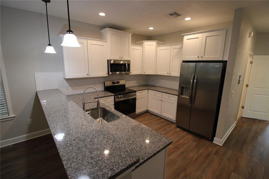 Furnished interior view inside a new home in , Lake City (Image 9). Furnished interior view inside a new home in , Lake City (Image 9).