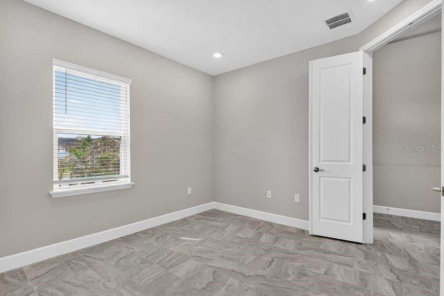 Spacious, unfurnished interior of a new home in Colbert Landings, Palm Coast (Image 16).