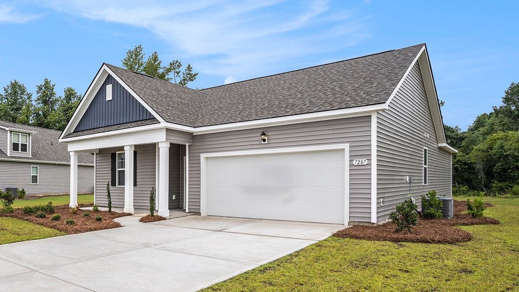 Front exterior of a new home in Eden Springs, Longs, SC, highlighting curb appeal (Image 22).