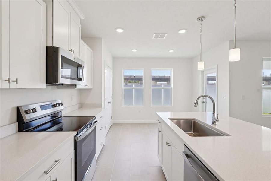 Furnished interior view inside a new home in Cyrene at Harmony, St. Cloud (Image 8).