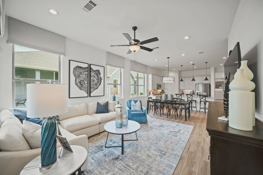 Representative furnished interior of a home built from the Athens by Chesmar Homes in Sunterra, Katy (Image 12).
