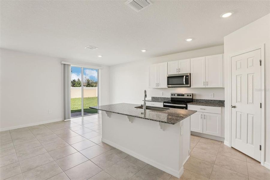 Furnished interior view inside a new home in Lawson Dunes - Signature Series, Haines City (Image 5).