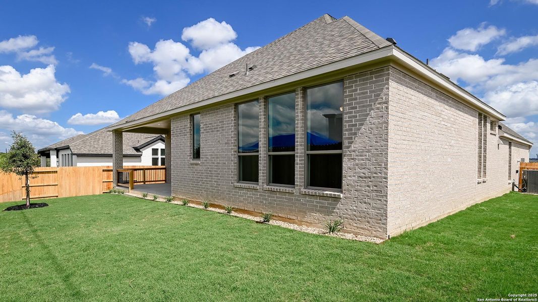 Exterior details and patio area of a home in Cibolo Valley Heights 65', Cibolo (Image 4).