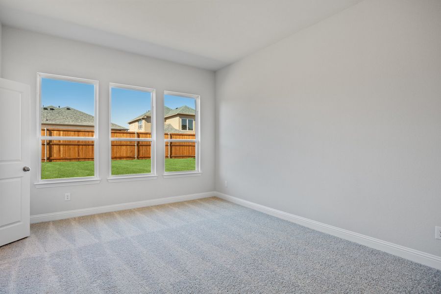 Representative unfurnished interior of a home built from the Waverly III by Megatel Homes in Bellagio, Forney (Image 13).
